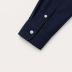 navy blue cotton poplin shirt sleeve detail close up