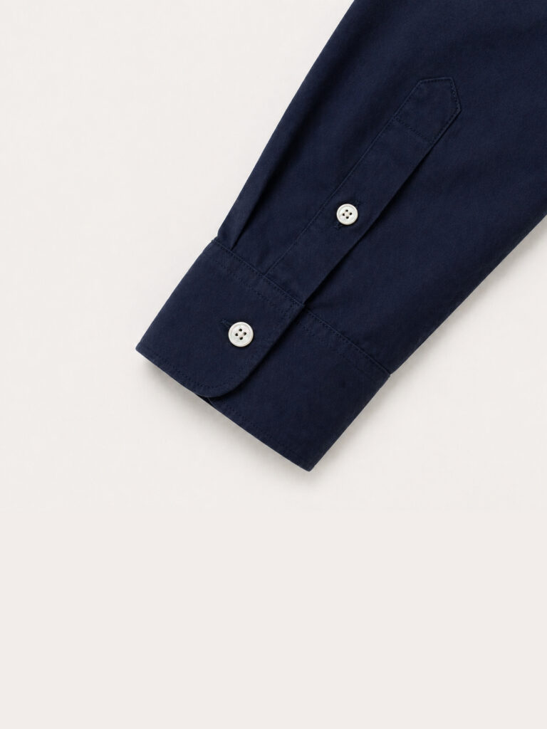 navy blue cotton poplin shirt sleeve detail close up