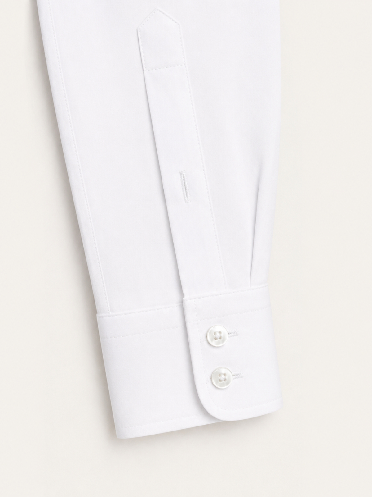 white cotton poplin shirt sleeve detail close up