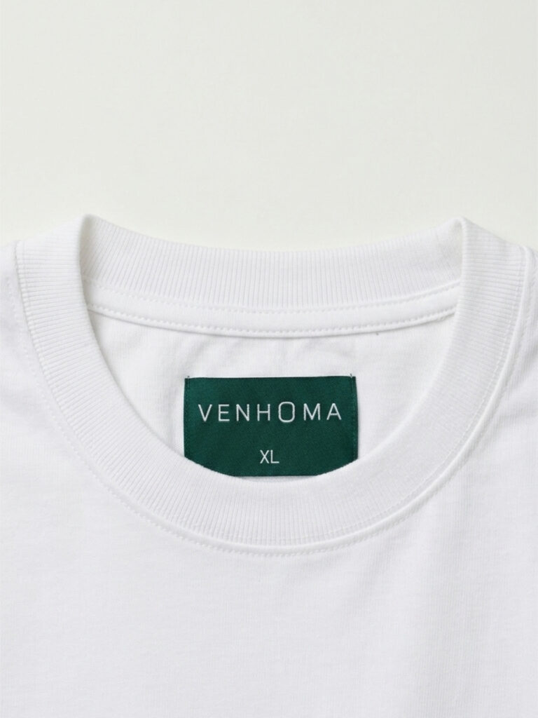 white t shirt front neck label close up